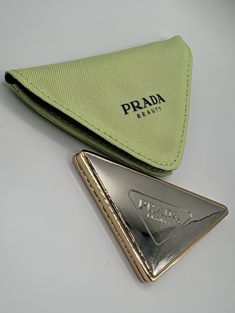 Prada Gold-Tone Triangle Compact Mirror with Light Green Case